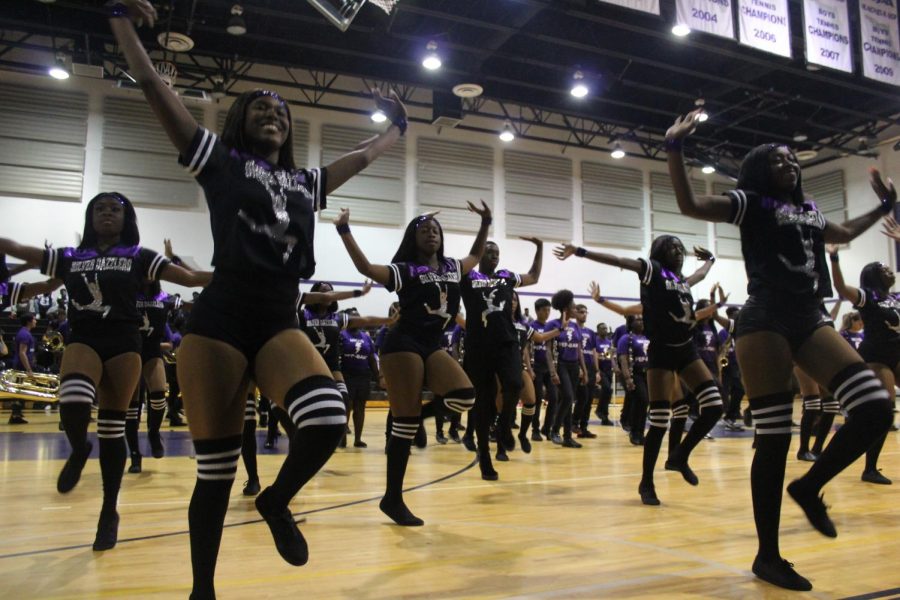 The Krop Silver Dazzlers perform during the homecoming Pep Rally.