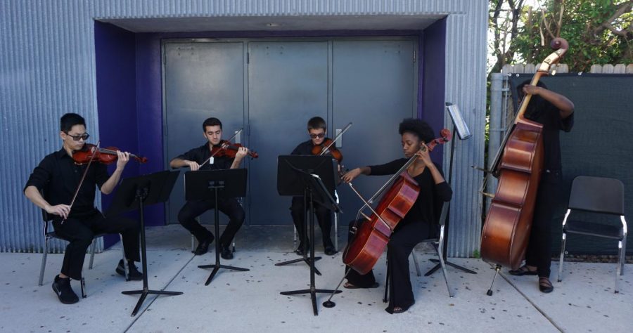 (From left to right) Orchestral Magnet students Christopher Wu, Eduardo Chocron, Alexander Khlovstov, Najuma Houchard and Rose Charles perform for the arrival of Superintendent Carvalho and school district representatives for the iPrep groundbreaking ceremony. Krops iPrep academy plans to open in the fall of 2018.