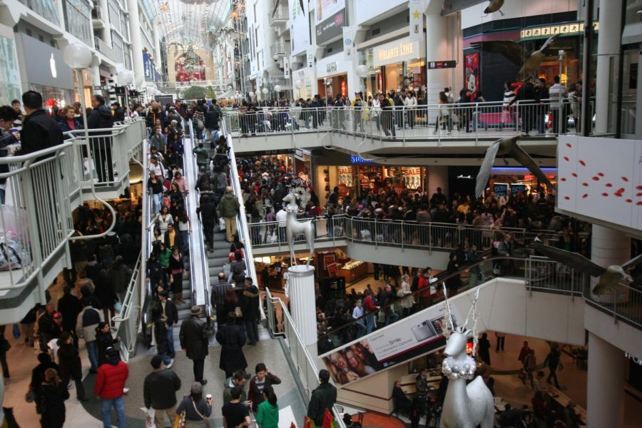 Shoppers rush to purchase goods at the Eaton shopping center in Toronto, Canada.