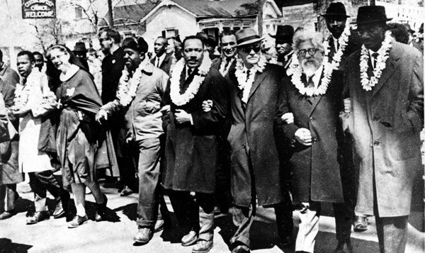 Dr. Martin Luther King Jr., center, and Rabbi Abraham Joshua Heschel, second from right, march in Selma. The Selma-to-Montgomery march was held in 1965.