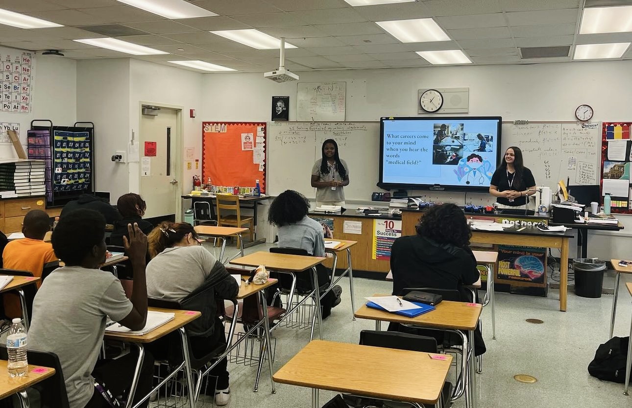 STUDENT LEADERS: Seniors Yadlie Joseph and and Simja Haratz giving a
presentation on Youth Med Connect.